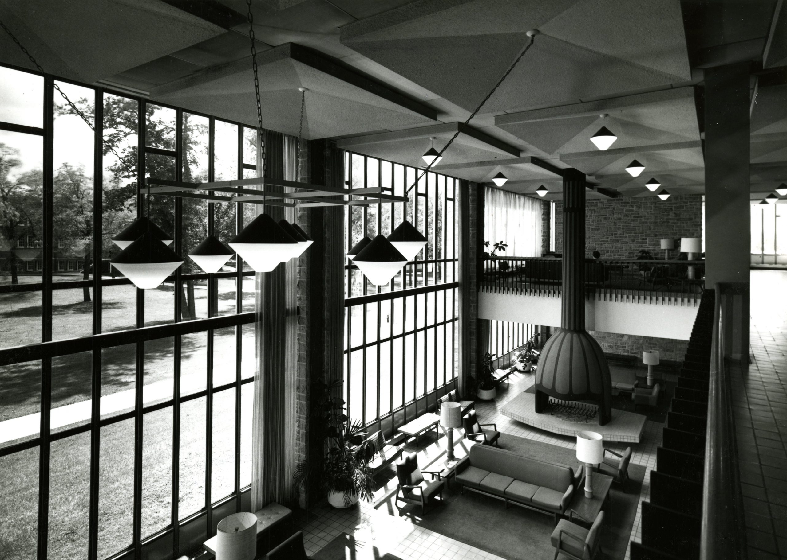 A lounge with high ceilings and modern design