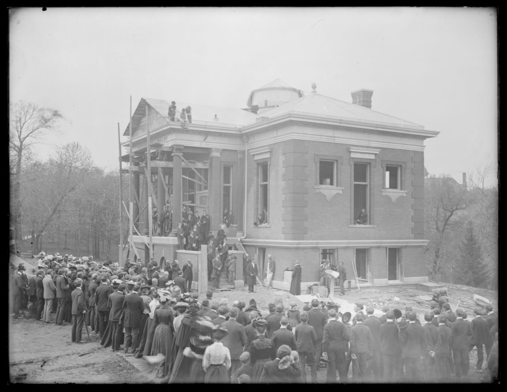 Many onlookers gather around newly-constructed Steensland Hall
