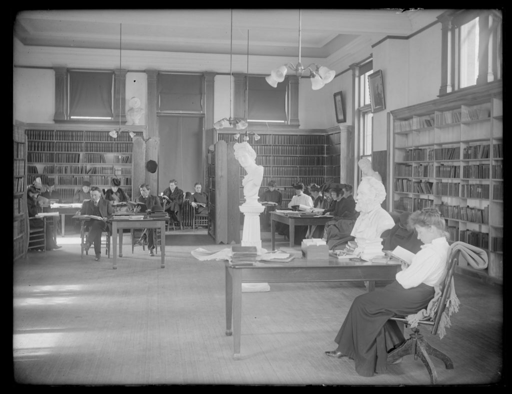Students studying in the original library