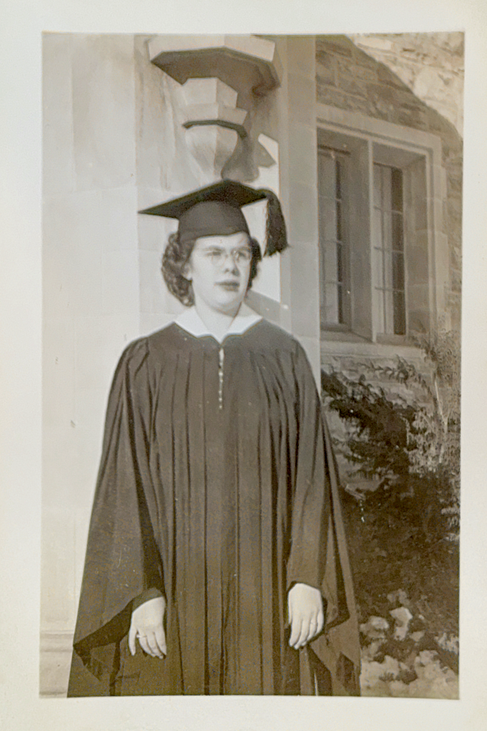 Mary Evelyn Fogde Rose '46 standing in front of Mellby Hall following the 1946 commencement ceremony.