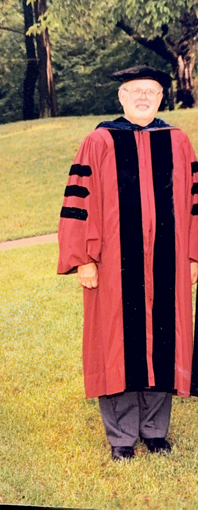 Myron Fogde '55 in full regalia for commencement at Augustana College, where he was a professor of religion for 35 years.