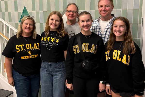 The family together in New Hall for Homecoming and Family Weekend 2024. Back row: Michael Marlett '94 and Brook Jacobsen '99. Front Row: Carey Jacobsen '96, Elise Marlett '25, Anna Jacobsen '28, and Emily Jacobsen.