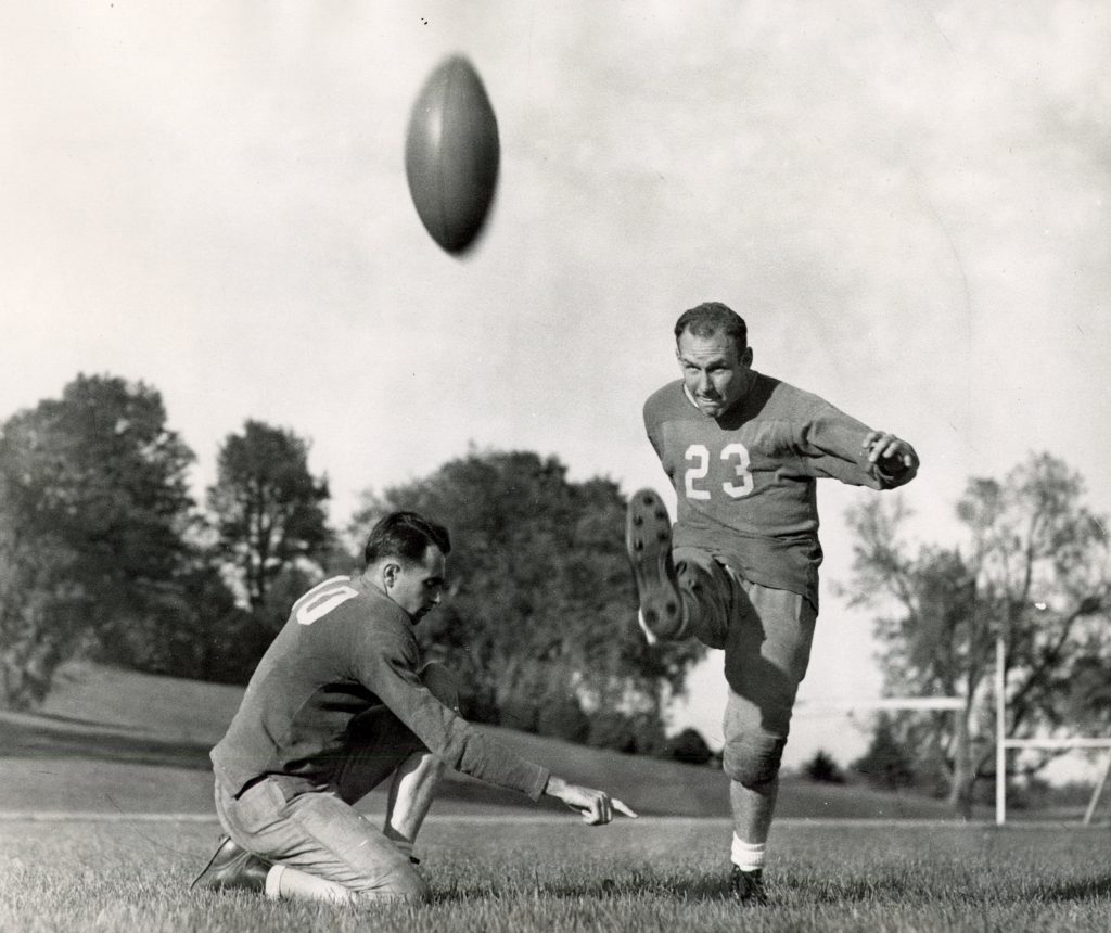 John “The Tulsa Toe” Sibole ’49 kicks the football for St. Olaf in 1946.